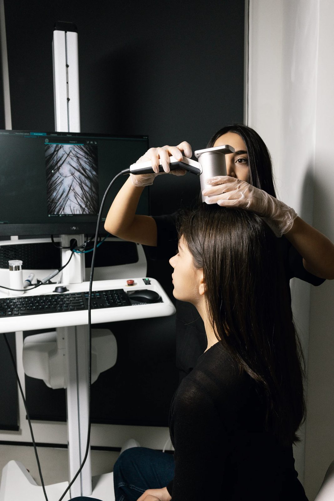 A trichoscopy examination of the scalp in progress at Beauté Concept