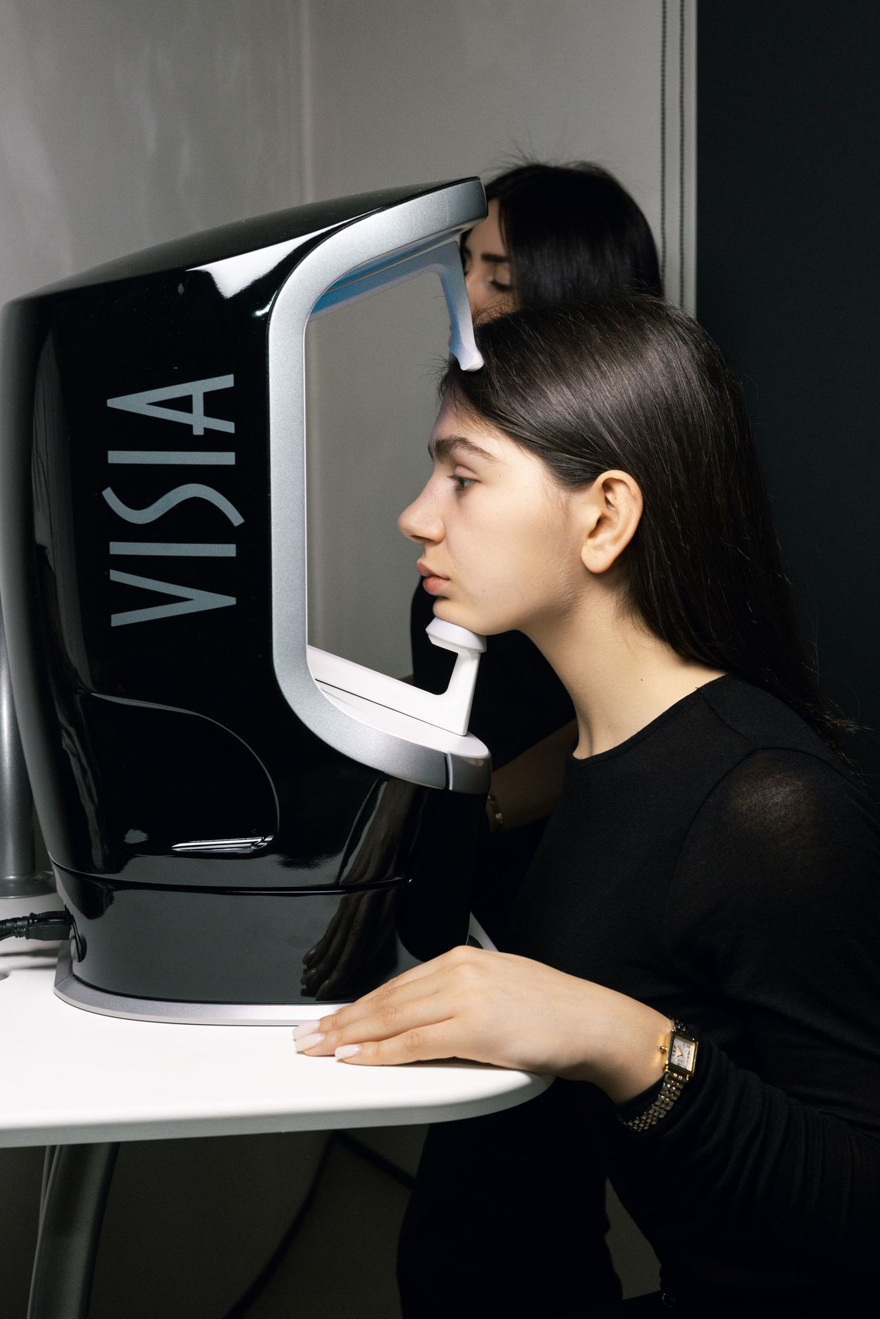 A patient positioned in the VISIA capture booth at Beauté Concept